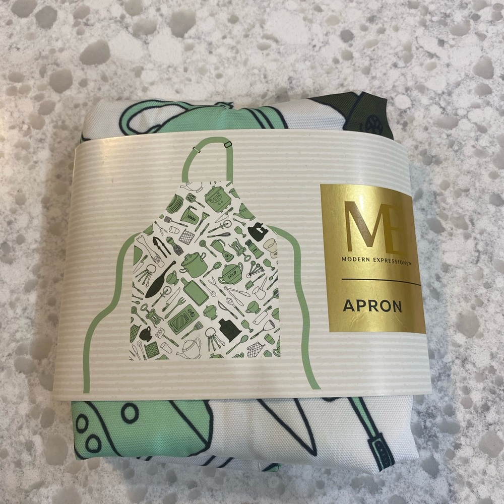 NWT Modern Expressions apron, white with light green/black kitchen tools.
